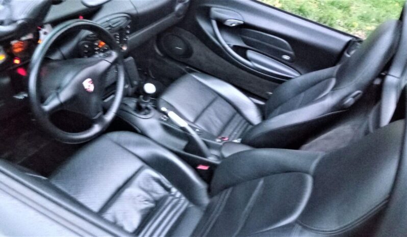 
								2004 Porsche Boxster plné									